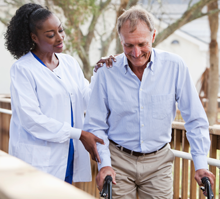 Man walking with nurse